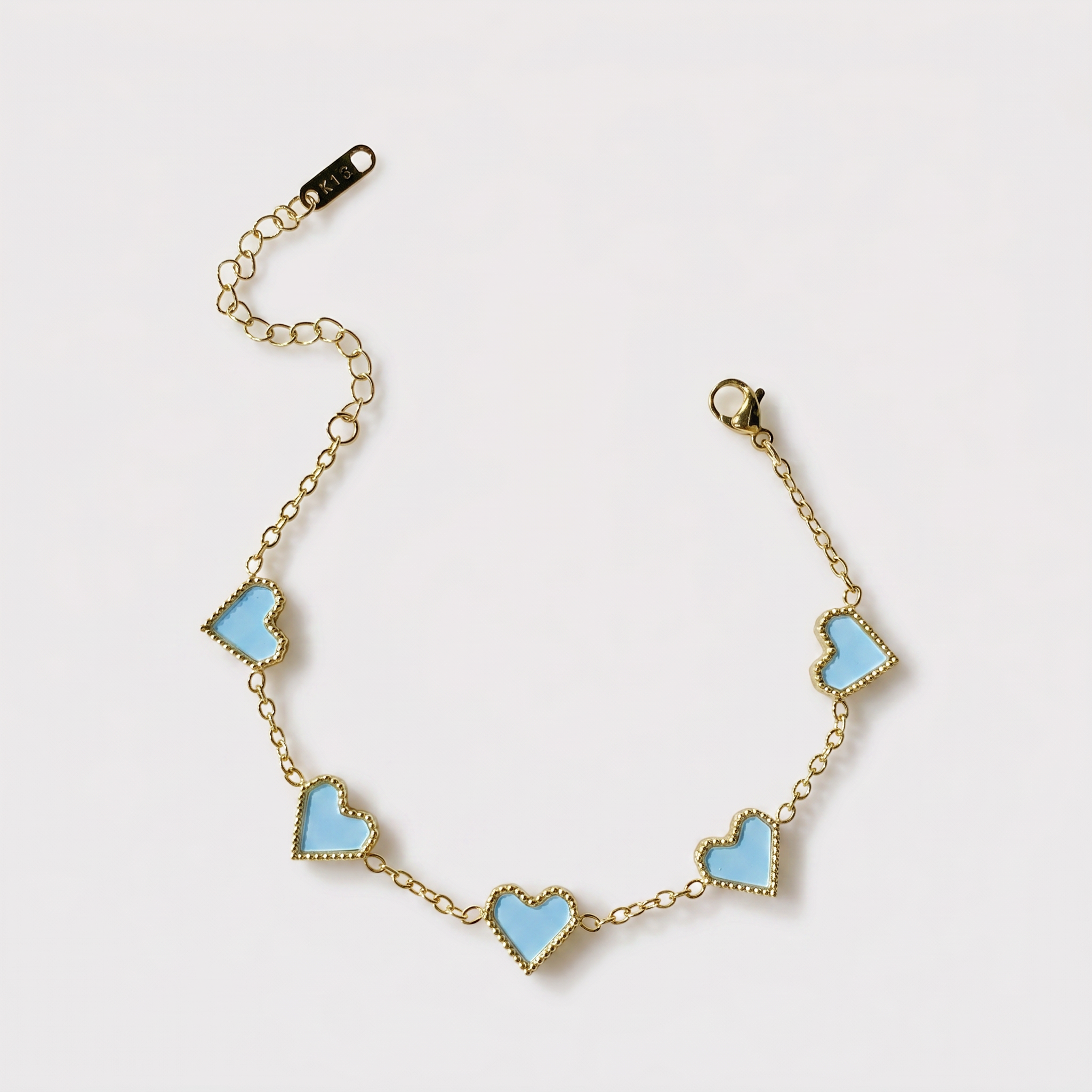 5 Heart Motif Bracelet in Blue