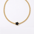 Black Forget Me Knot Flower Pendant in Gold
