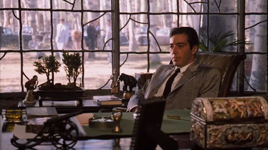 stunning michael corleone siting on chair