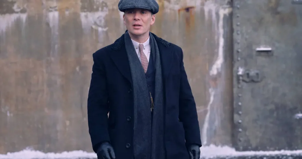 tommy shelby with dark grey type scarf 