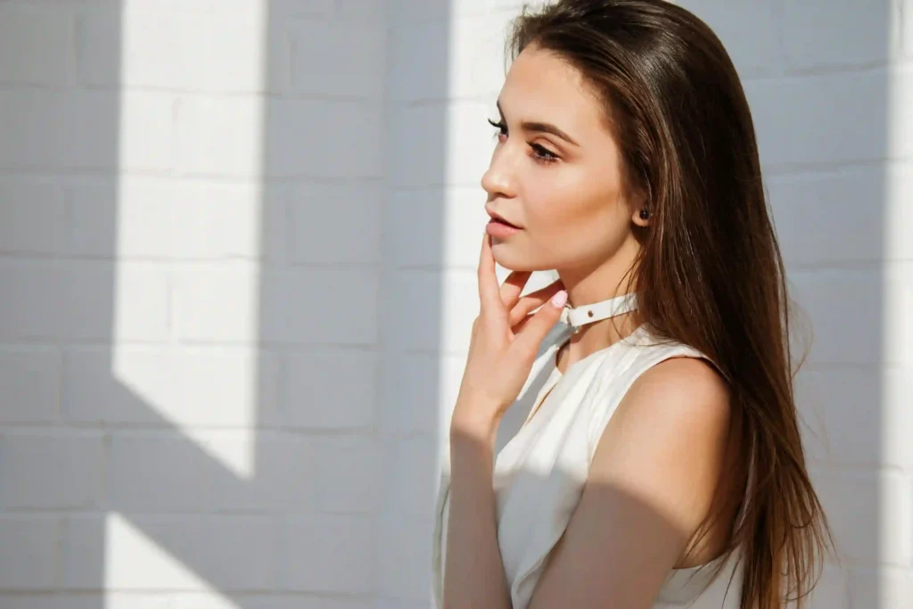 Elegant women thinking in white dress