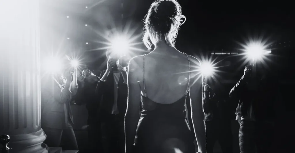 Master the Art of First Impressions. Celebrity Lady paparazzi snaping photos