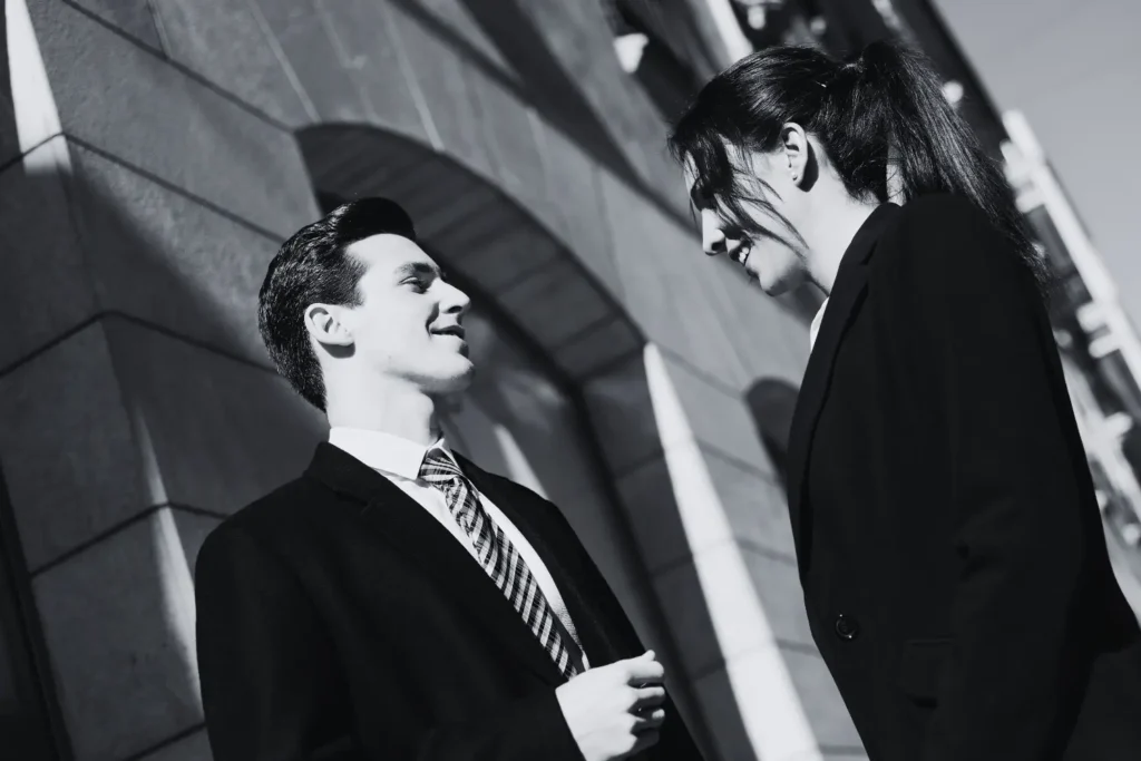 Two elegant Men and Women having a conversation